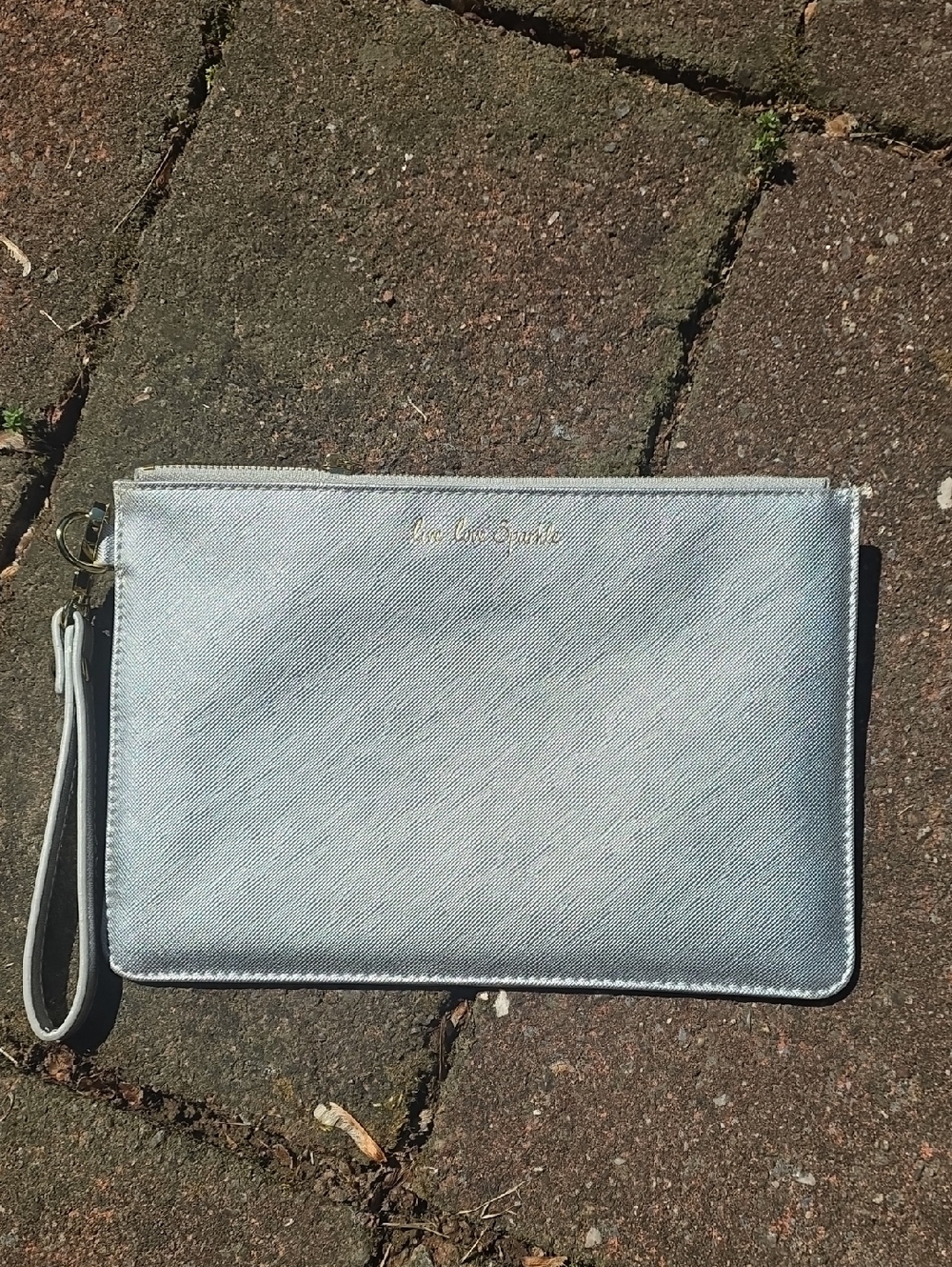 Silver Wristlet Clutch with Gold Script Logo